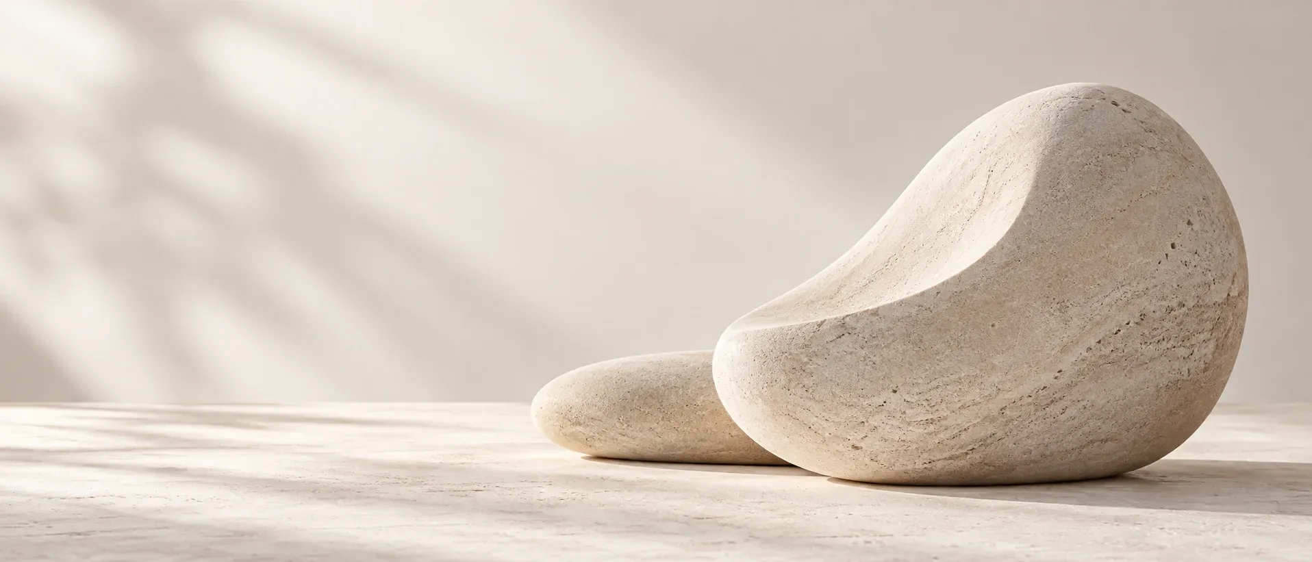 A smooth stone shape on a pale background