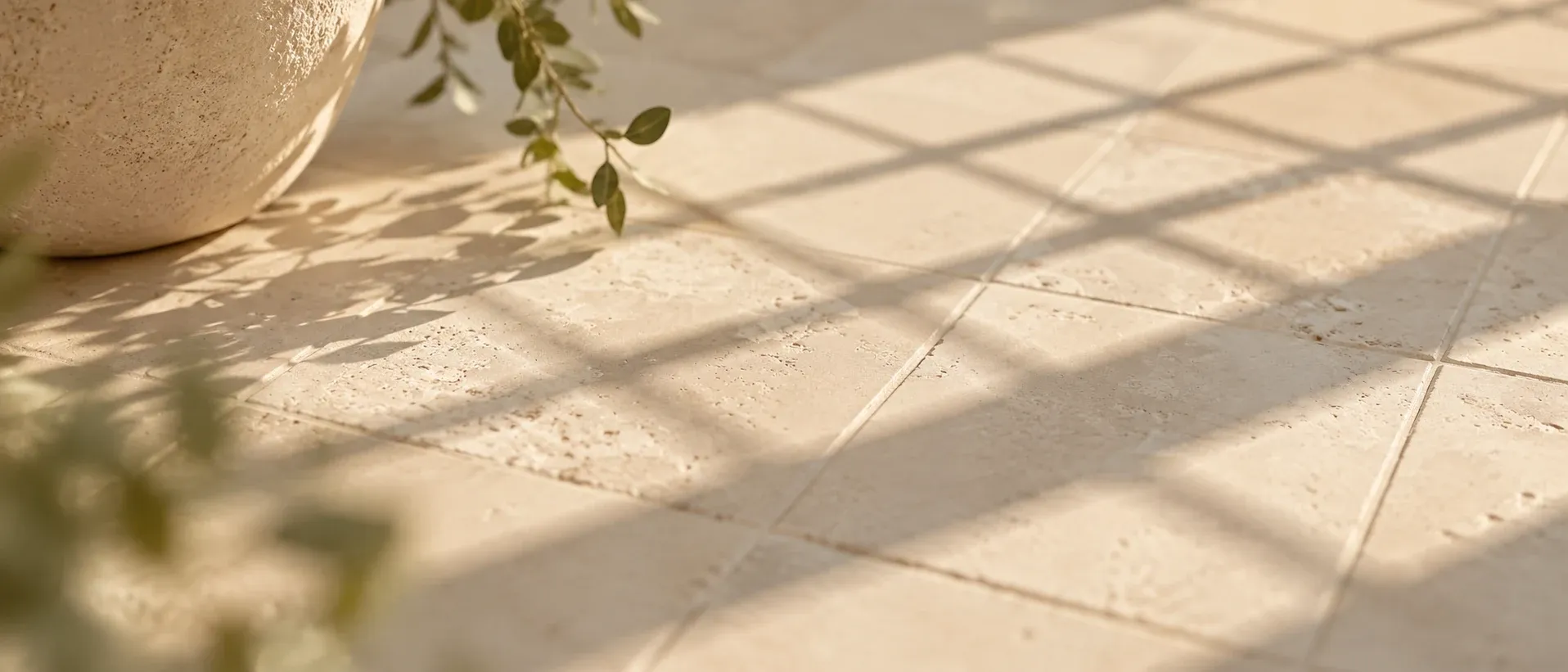 A grid pattern in soft light on a pale surface